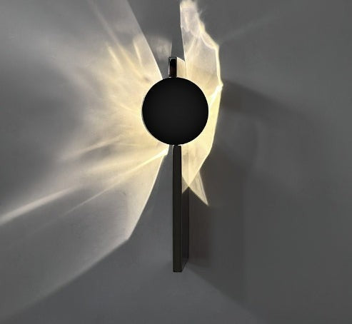Applique murale Lumeoo STEELIX en inox noir avec design minimaliste et éclairage LED diffusant une lumière douce
