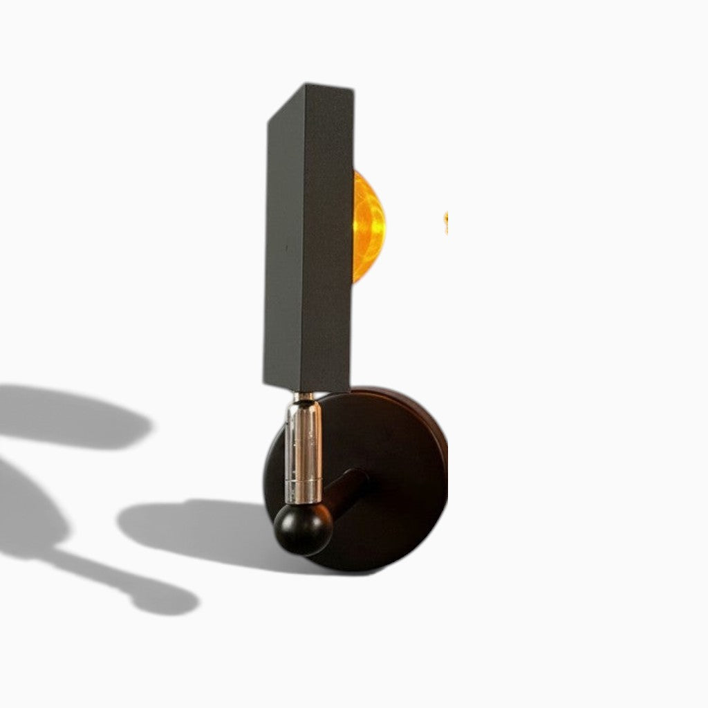 Applique murale Lumeoo SUNWALL noire avec projection lumineuse effet coucher de soleil pour une ambiance chaleureuse