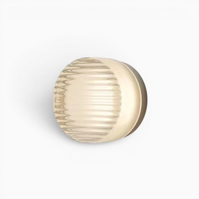 Applique murale LED ronde Lumeoo avec diffuseur texturé pour un éclairage chaleureux et élégant