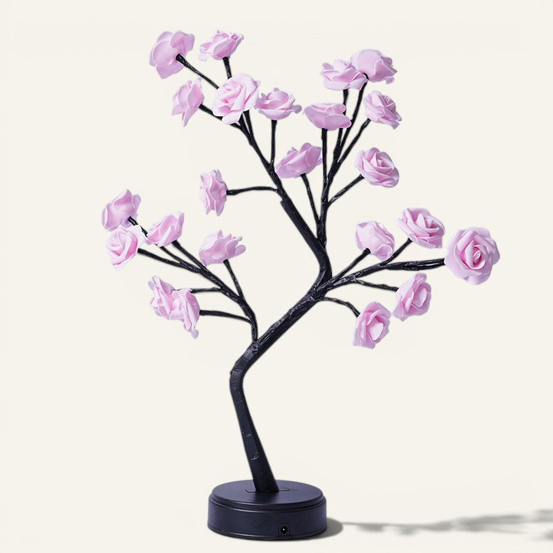 Lampe arbre Lumeoo avec fleurs roses LED sur branches noires, idéale pour une décoration romantique de chambre.
