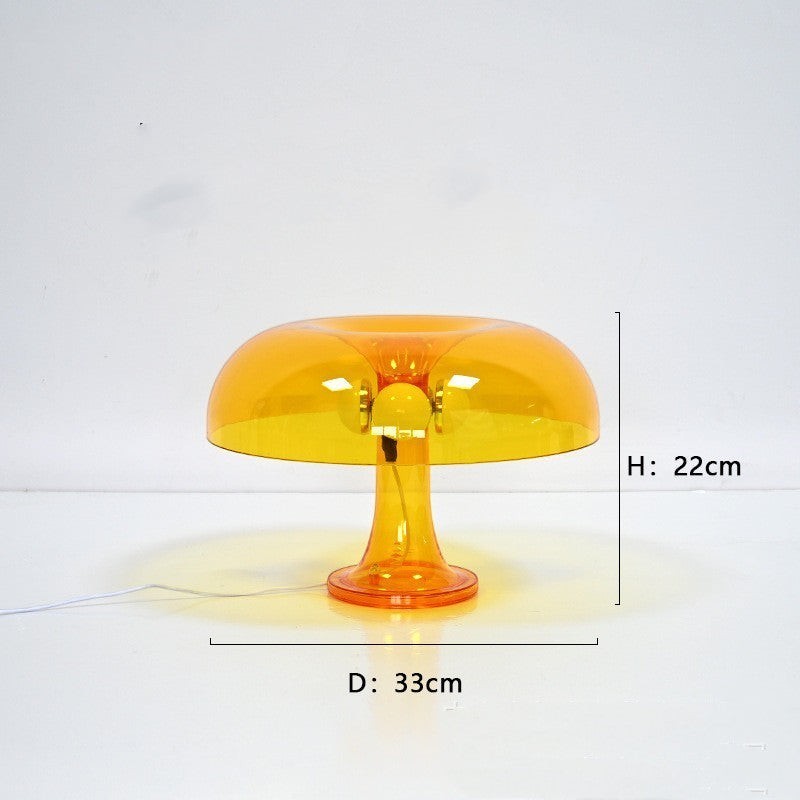Lampe champignon Lumeoo orange transparente au design moderne diffusant une lumière douce et chaleureuse