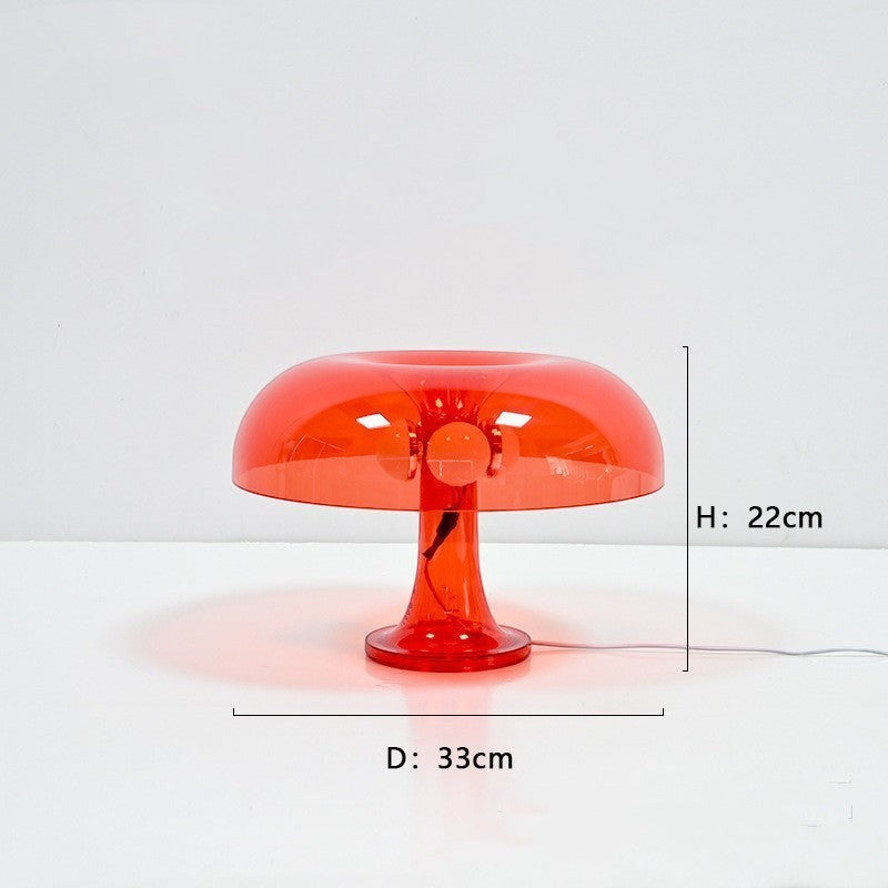 Lampe champignon Lumeoo rouge transparente au design moderne et minimaliste pour une ambiance lumineuse douce