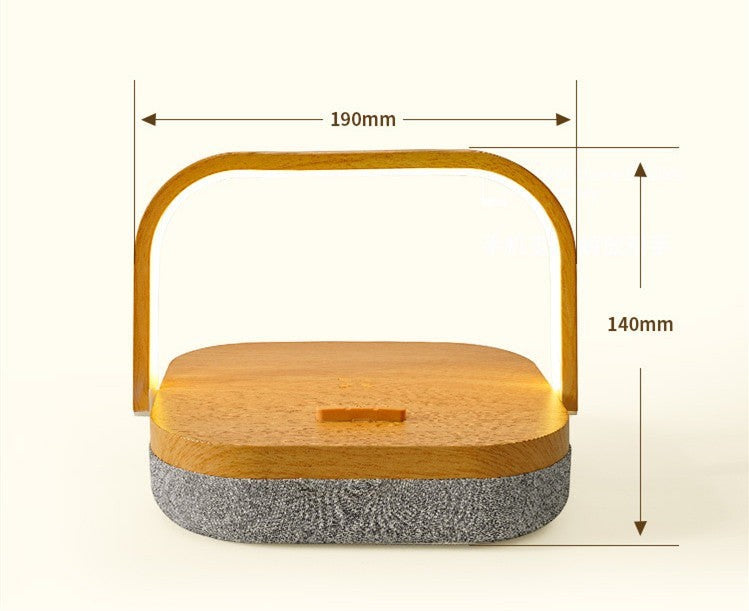 Lampe de chevet Lumeoo 3 en 1 en bois avec enceinte Bluetooth et chargeur induction, design moderne et compact.