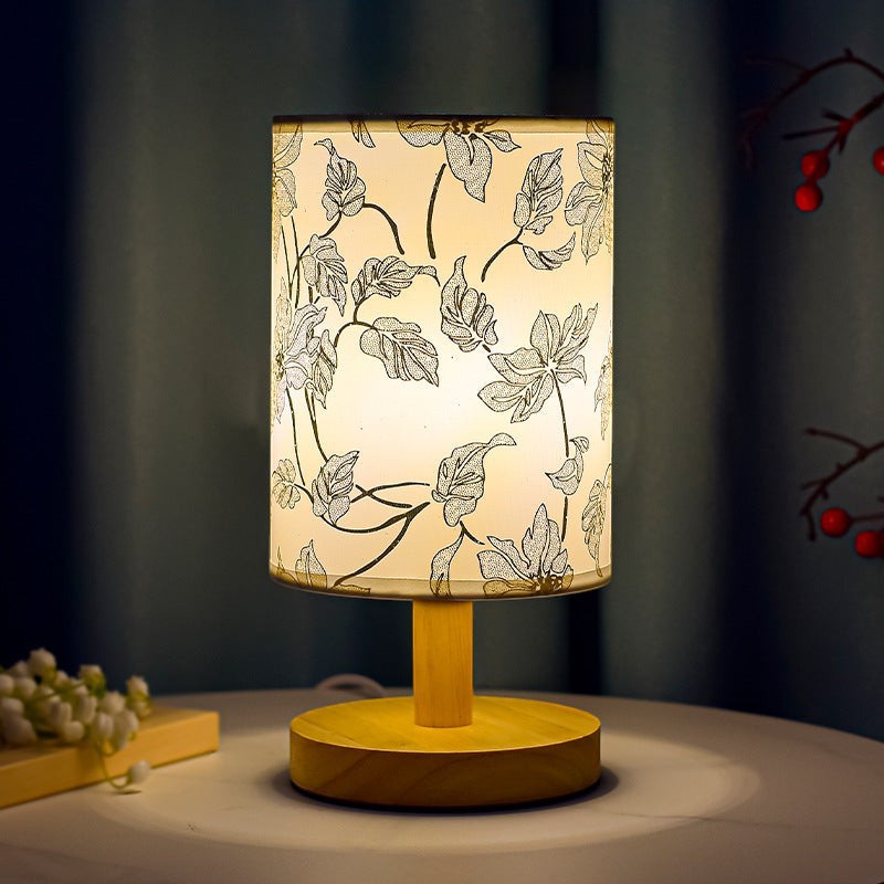 Lampe de chevet Lumeoo style chinois avec abat-jour cylindrique à motifs floraux et base en bois clair