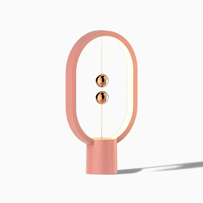 Lampe de chevet design Lumeoo rose avec interrupteur magnétique et billes flottantes lumineuses