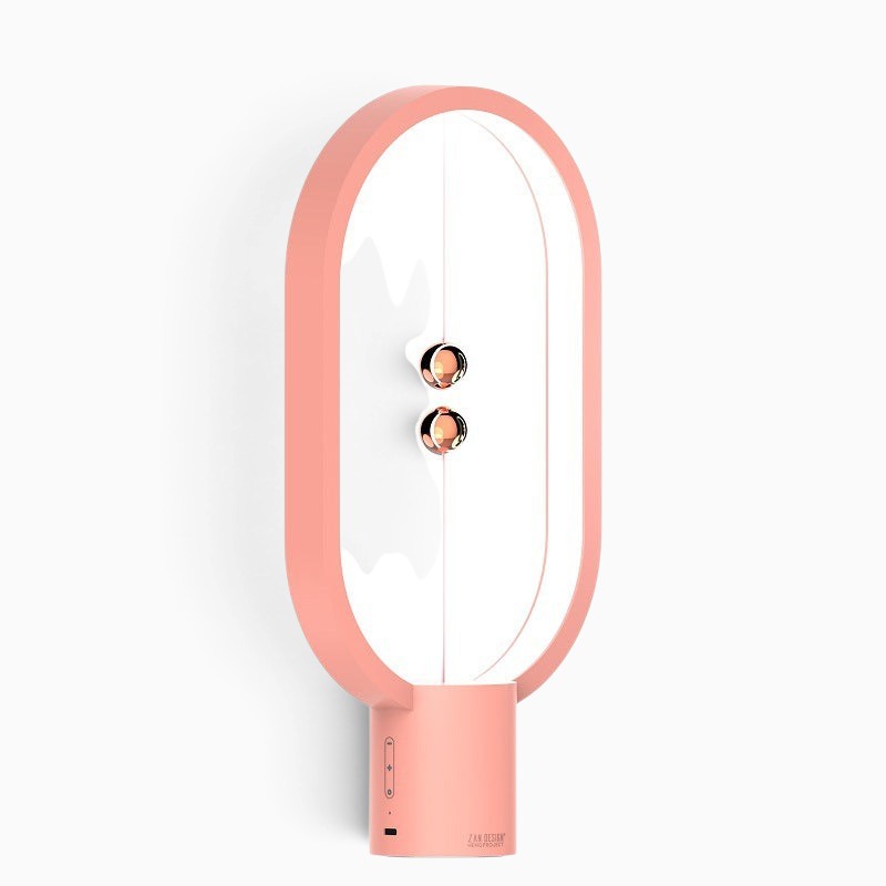 Lampe de chevet Lumeoo EQUILUX rose avec interrupteur magnétique à billes flottantes et éclairage LED design