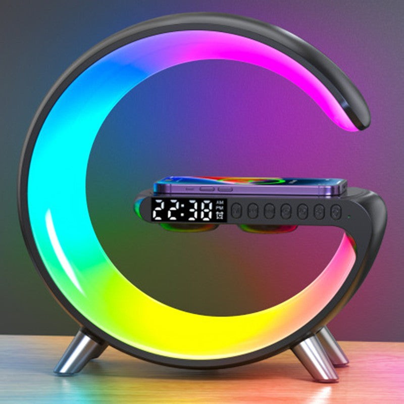 Lampe chevet Lumeoo RGB en forme de G avec chargeur sans fil, réveil numérique et simulation d'aube multicolore.