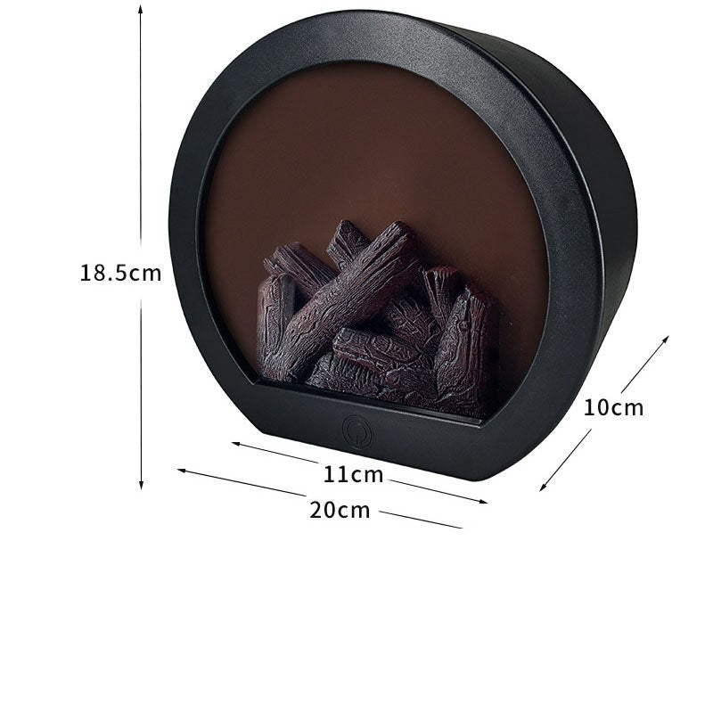 Lampe Lumeoo FLAMORA ronde noire avec effet flamme et bûches décoratives, idéale pour une ambiance cocooning.