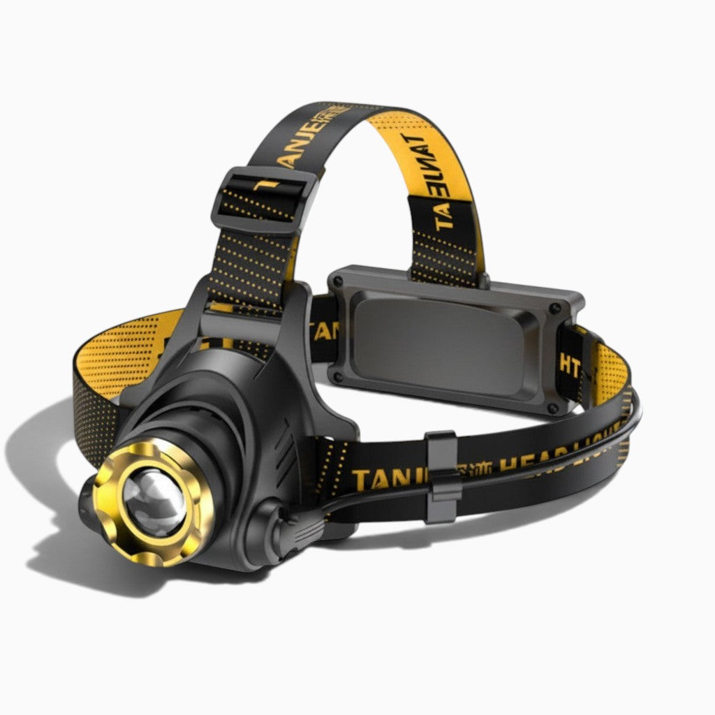 Lampe frontale Lumeoo ZOOMEX noire et dorée avec zoom télescopique, sangle réglable et trois modes d'éclairage LED.