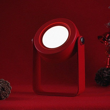 Lanterne LED Lumeoo rouge pliable et tactile, design moderne pour une ambiance chaleureuse et décorative.
