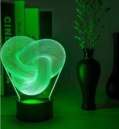 Lampe LED 3D Lumeoo en acrylique avec design torsadé lumineux vert, idéale comme veilleuse tactile pour chambre.
