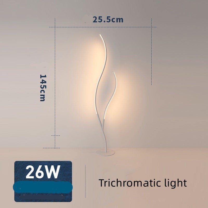 Lampe sur pied Lumeoo au design sculptural en forme de branche blanche avec éclairage LED diffusant une lumière douce
