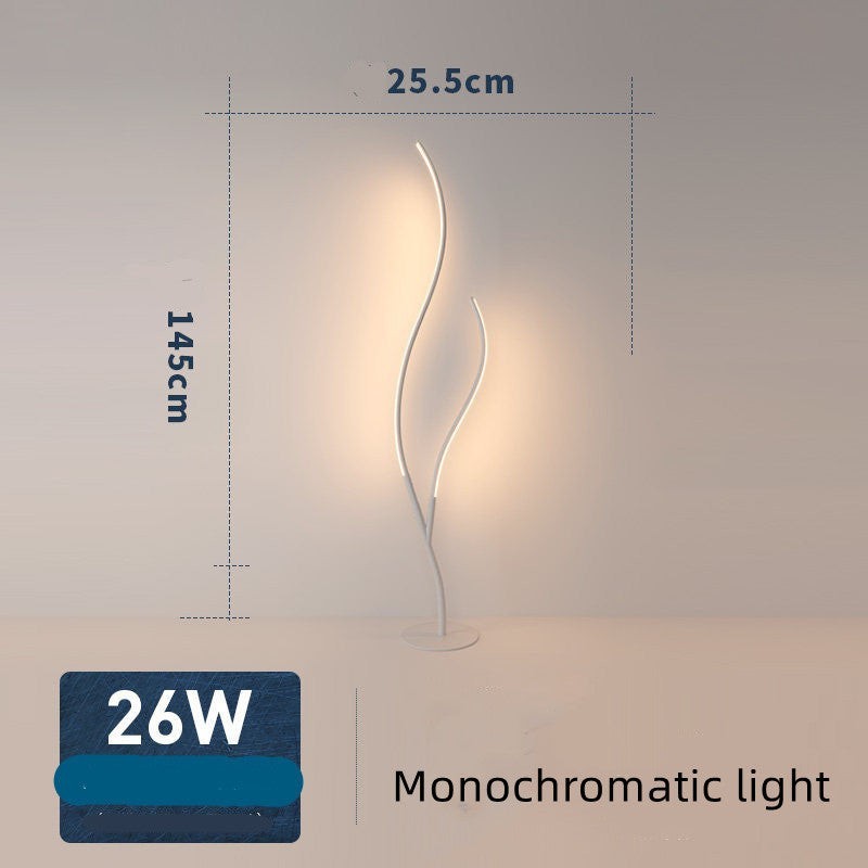 Lampe sur pied Lumeoo au design sculptural en forme de branche blanche avec éclairage LED diffusant une lumière douce