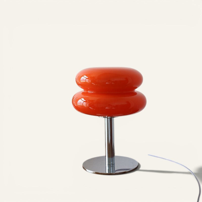 Lampe à poser Lumeoo VERRUX orange en verre et métal chromé, style nordique, LED dimmable sur une table en bois.