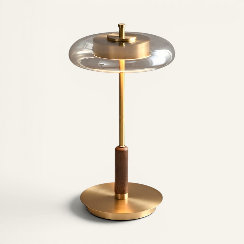 Lampe de table Lumeoo BRASSOVA en laiton doré, bois sombre et verre transparent au design luxueux et moderne