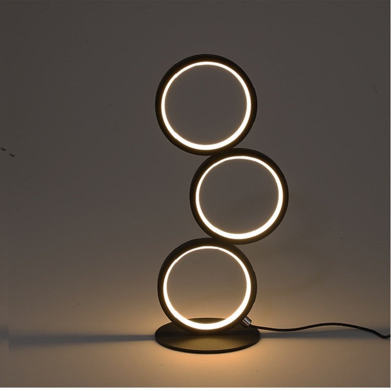 Lampe de table Lumeoo TOUCHLUX noire à trois anneaux LED tactiles pour un éclairage d'ambiance moderne