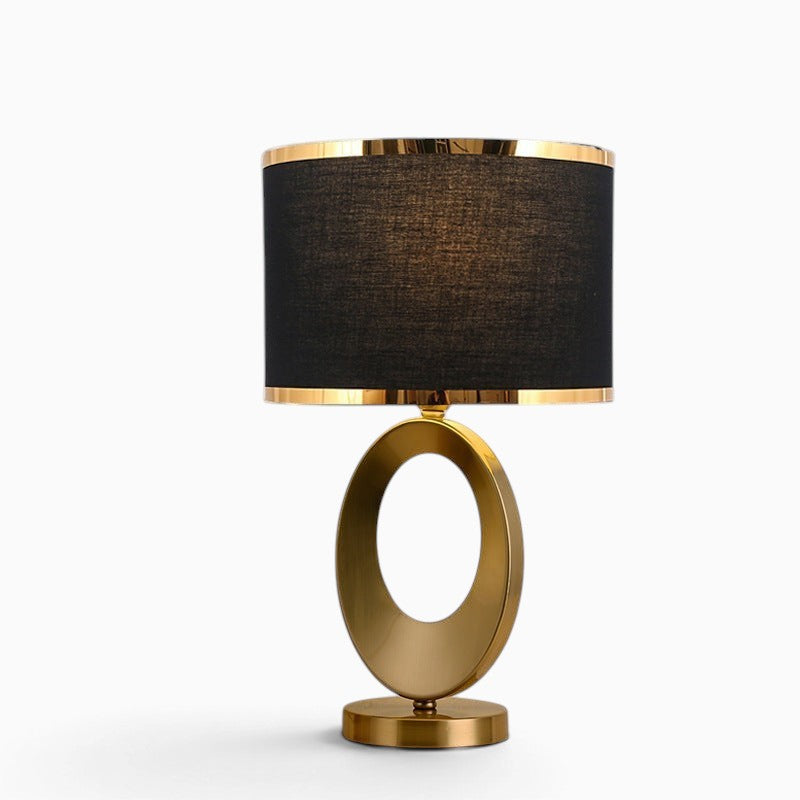 Lampe de table Lumeoo moderne avec abat-jour noir et pied ovale en métal doré pour salon ou chevet