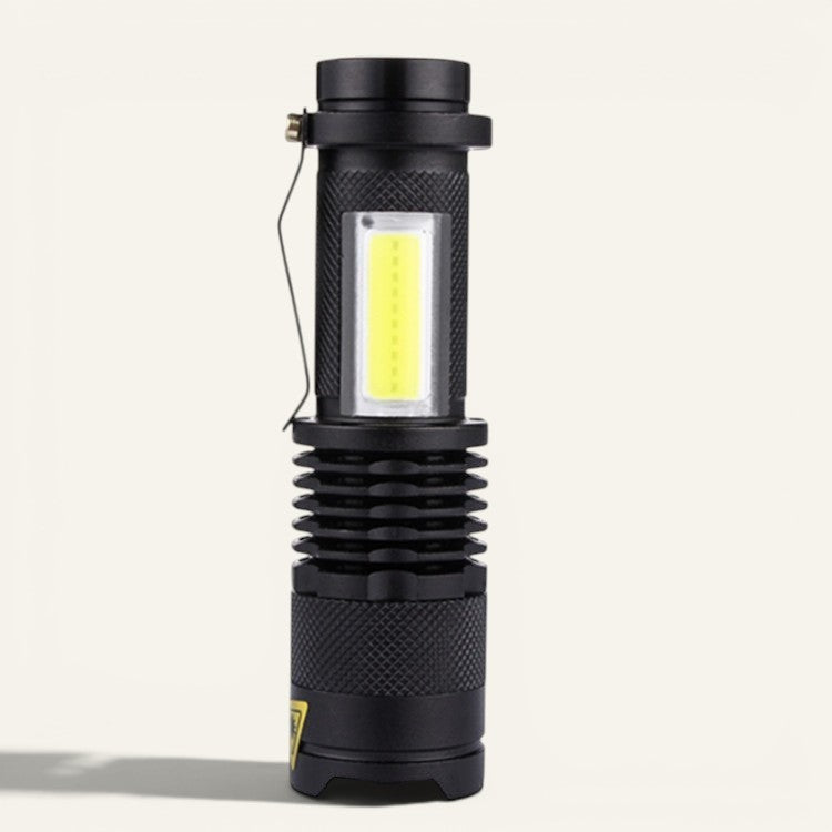 Lampe de poche LED COB rechargeable Lumeoo en aluminium noir, compacte et robuste pour le camping et le jardin.