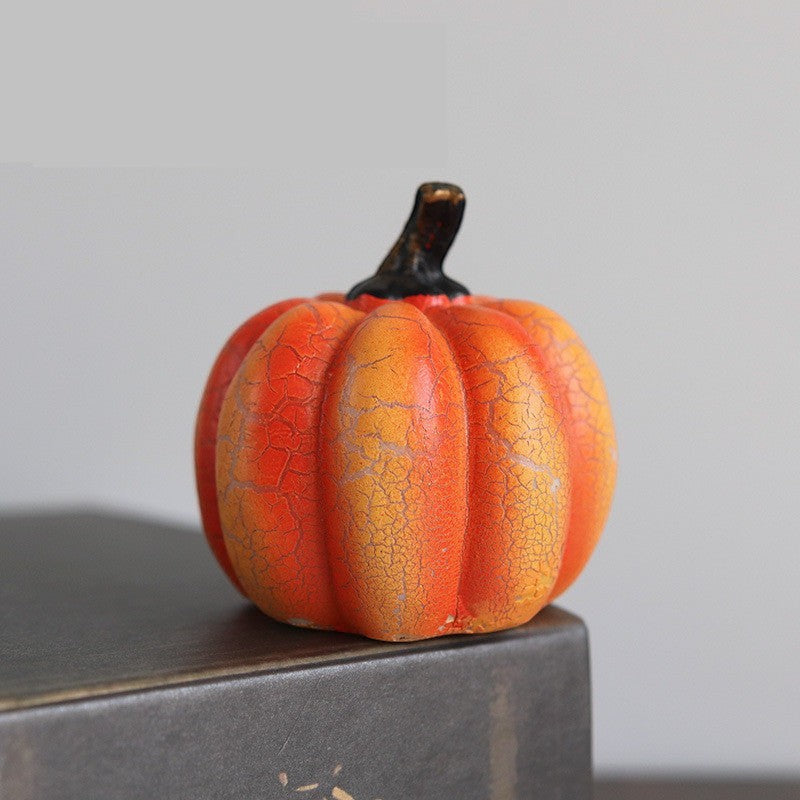Lanterne citrouille Lumeoo en résine orange avec effet craquelé, décoration lumineuse LED pour Halloween.