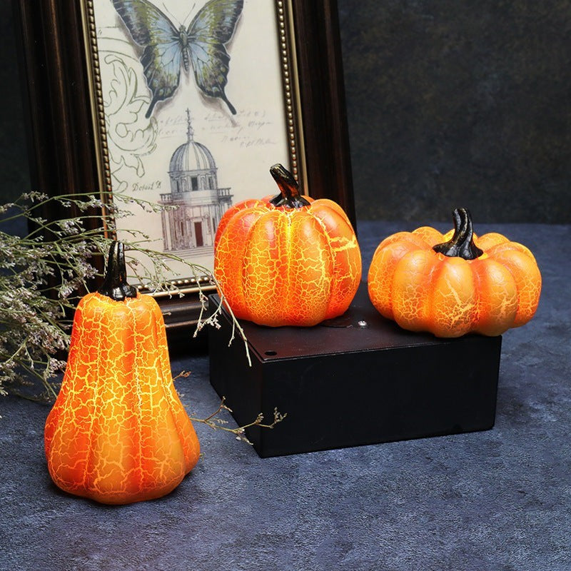 Lanterne citrouille Lumeoo en résine avec effet craquelé lumineux LED pour une décoration d'Halloween chaleureuse.