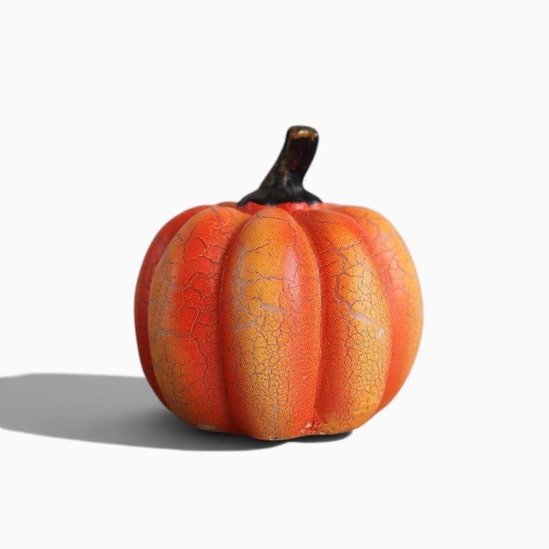 Lanterne citrouille Halloween LED Lumeoo en résine orange avec effet craquelé pour une décoration festive