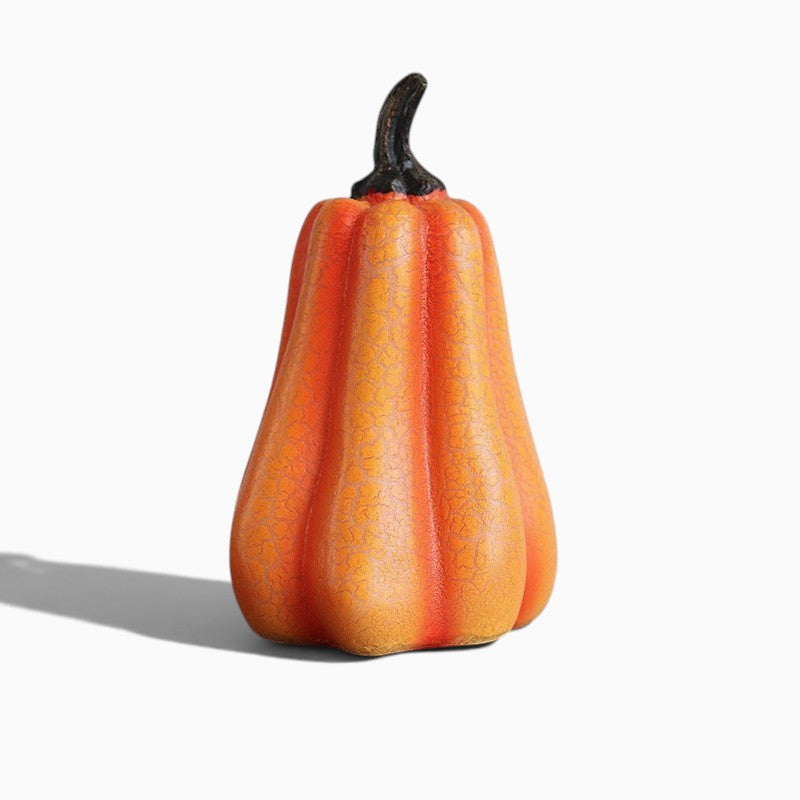 Lanterne citrouille Halloween Lumeoo en résine orange avec finition texturée et tige noire pour décoration festive