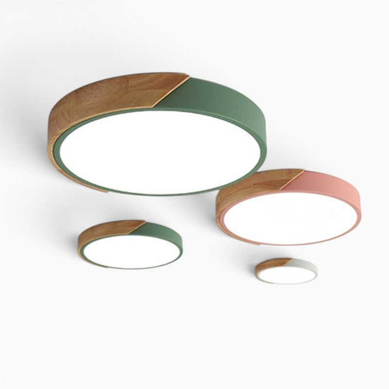 Plafonniers LED ronds Lumeoo style nordique avec détails en bois et bords colorés pastel pour une ambiance douce.