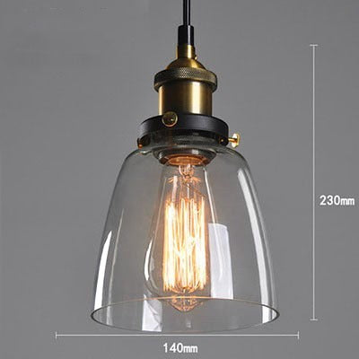 Suspension Lumeoo en verre fumé avec douille en laiton vieilli et ampoule Edison pour une ambiance rétro