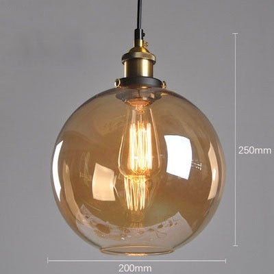 Suspension Lumeoo FUMOVA en verre fumé ambré avec douille en laiton pour une ambiance rétro et chaleureuse
