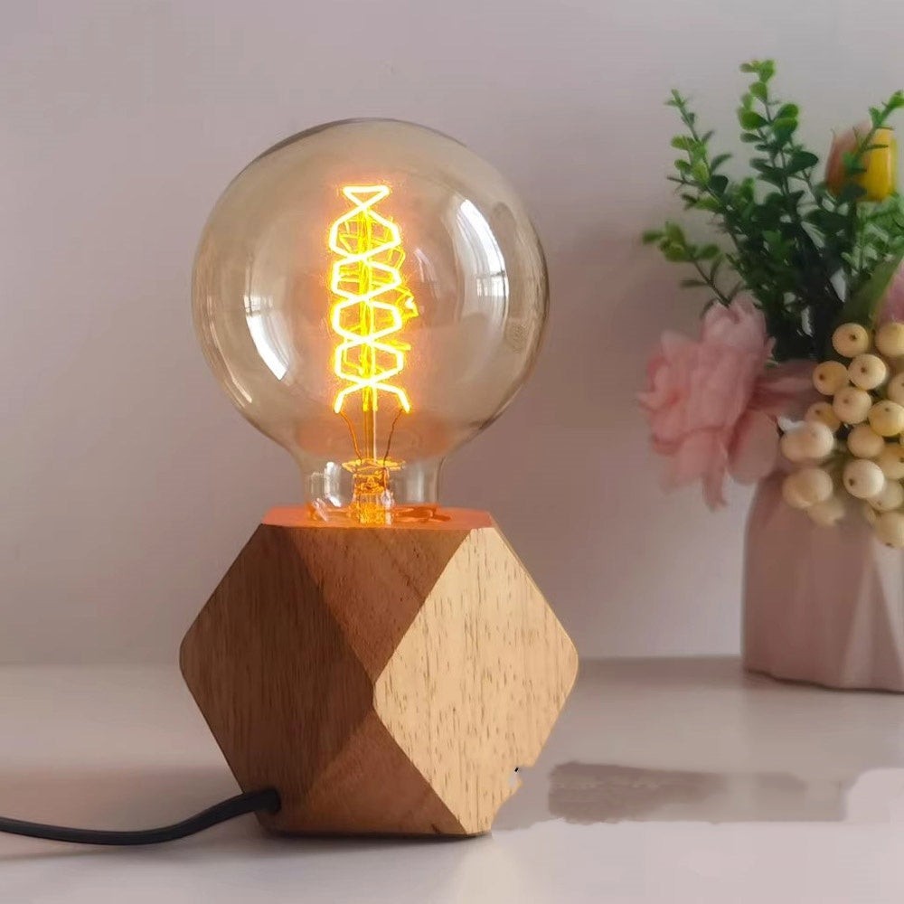 Veilleuse Lumeoo avec ampoule vintage à filament sur socle en bois géométrique pour une ambiance japonaise zen