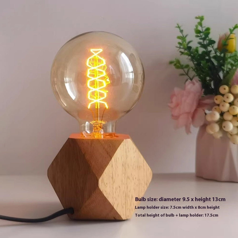Veilleuse Lumeoo avec ampoule vintage à filament LED sur socle en bois géométrique pour une ambiance japonaise zen