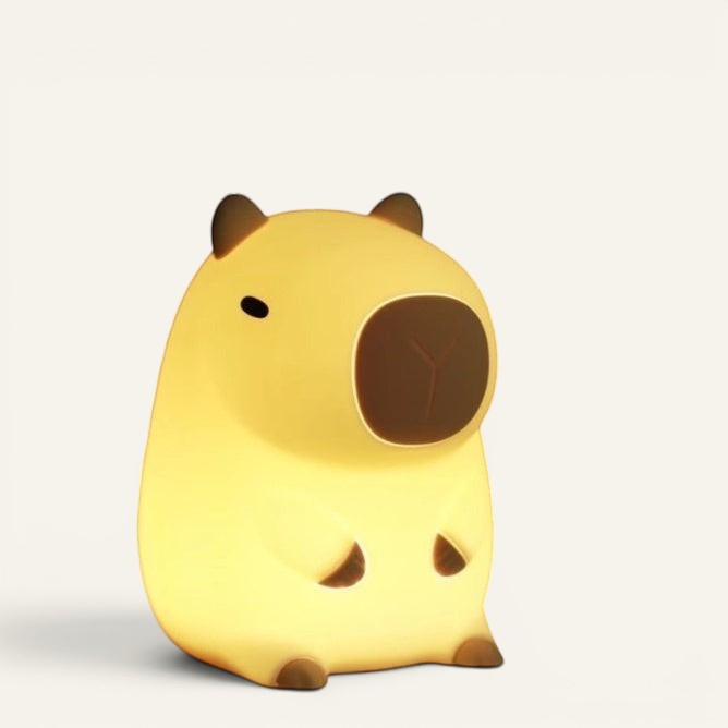 Veilleuse Lumeoo en silicone en forme de cochon d'Inde jaune diffusant une lumière douce pour chambre d'enfant