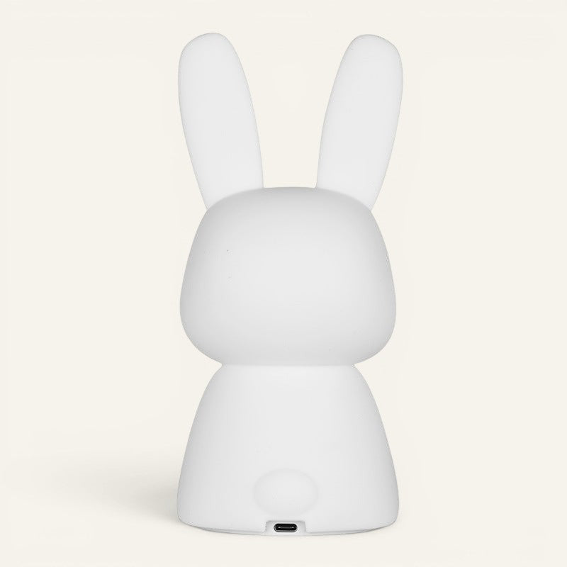 Veilleuse lapin Lumeoo en silicone blanc avec port de charge USB, idéale pour rassurer les enfants au moment du coucher