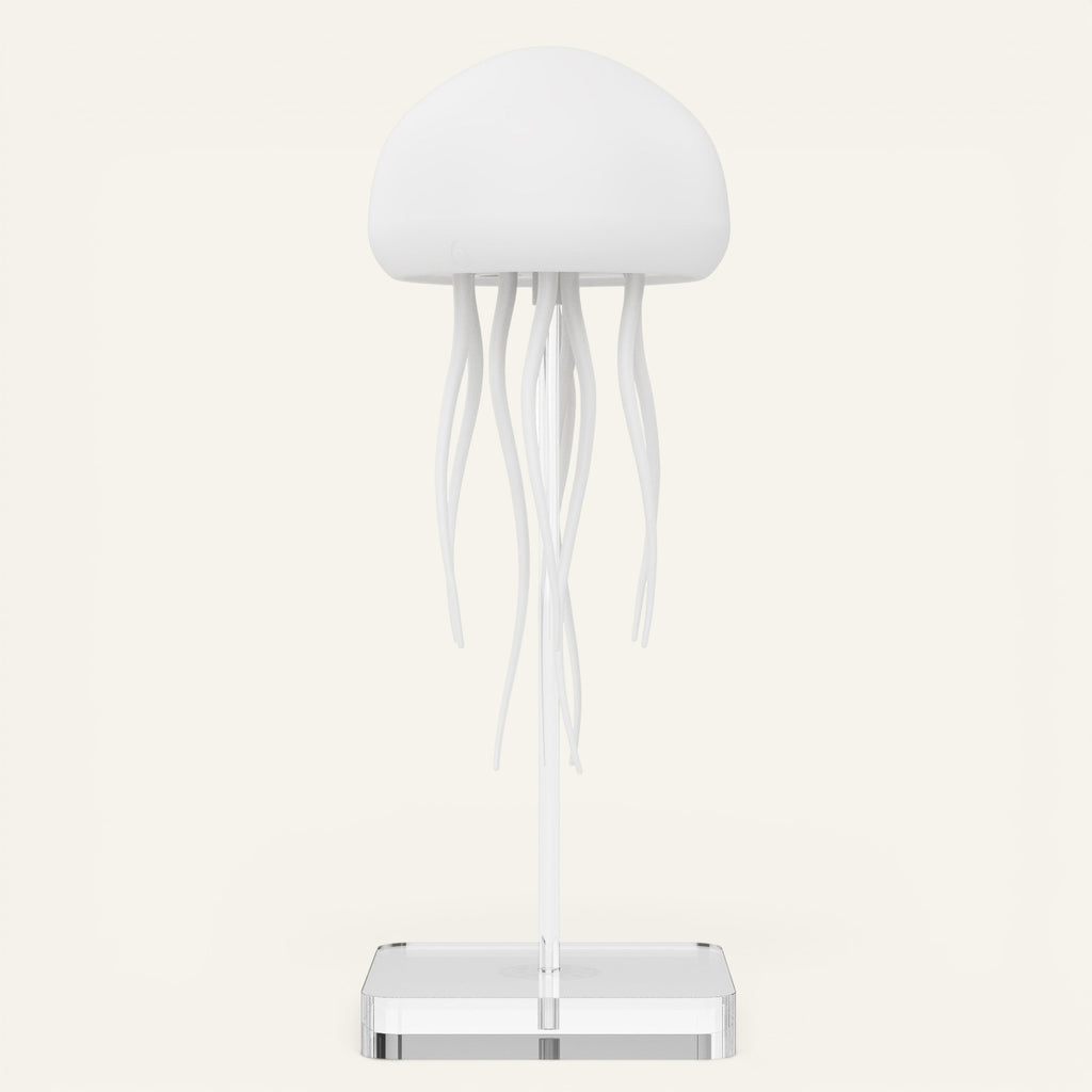 Veilleuse méduse Lumeoo blanche au design organique sur socle transparent, idéale pour une ambiance apaisante.