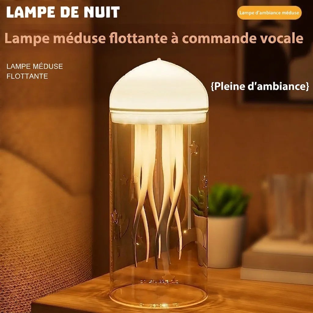 Veilleuse méduse Lumeoo avec dôme lumineux et tentacules flottants dans un cylindre en verre gravé d'étoiles