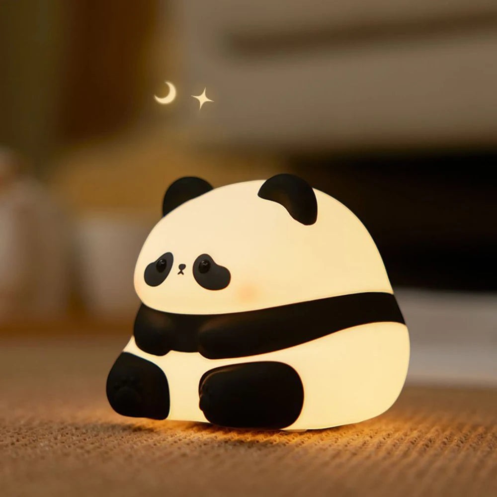Veilleuse Lumeoo en silicone forme panda diffusant une lumière douce et apaisante pour la chambre d'enfant