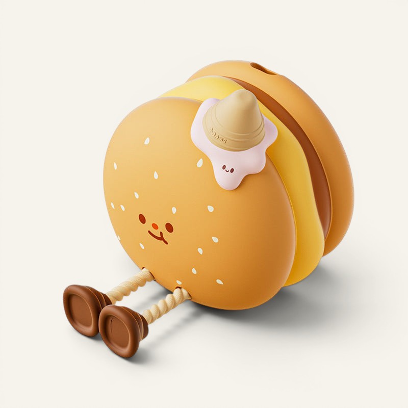 Veilleuse Lumeoo en silicone en forme de burger souriant avec des jambes, idéale pour une chambre d'enfant.