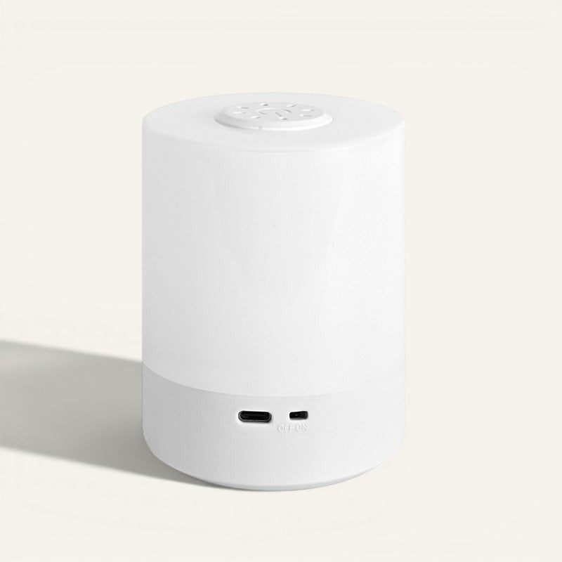 Veilleuse tactile rechargeable Lumeoo blanche cylindrique avec port de charge USB pour une lumière chaude apaisante
