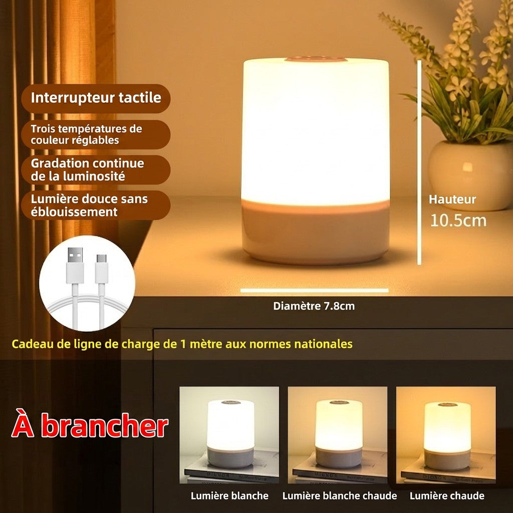 Veilleuse tactile Lumeoo rechargeable avec lumière chaude, réglable en intensité et température, posée sur une table. Image